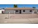 Charming single-story home with a well-maintained exterior and desert landscaping, plus an attached one car garage at 3222 W Wagoner Rd, Phoenix, AZ 85053