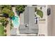 Aerial view of the property showcasing a pool, well-maintained landscaping, and an overall clean and organized backyard at 4020 W Anderson Dr, Glendale, AZ 85308