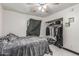 Bedroom with white tile flooring and closet space for storage, ideal for minimalist living at 4020 W Anderson Dr, Glendale, AZ 85308