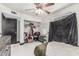 Bright bedroom with white tile flooring and an open closet at 4020 W Anderson Dr, Glendale, AZ 85308