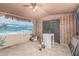 The room showcases unique beach-themed murals, enhancing the space's distinctive and personalized design at 4020 W Anderson Dr, Glendale, AZ 85308