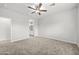 Bright bedroom featuring plush carpeting and ensuite bathroom access at 4160 N Kioha Dr, Eloy, AZ 85131