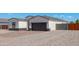 New home exterior with a two-car garage and rock driveway at 4160 N Kioha Dr, Eloy, AZ 85131