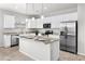 Modern kitchen island with granite countertop and seating at 4160 N Kioha Dr, Eloy, AZ 85131