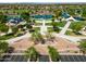 Aerial view of community park with lake and walking paths at 6375 W Sonoma Way, Florence, AZ 85132