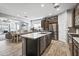 Modern kitchen with stainless steel appliances and an island at 6375 W Sonoma Way, Florence, AZ 85132