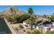 Ranch-style house with desert landscaping and mountain backdrop at 2320 E Shangri La Rd, Phoenix, AZ 85028