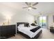 Stylish bedroom with a private balcony, providing a relaxing retreat at 2511 W Queen Creek Rd # 179, Chandler, AZ 85248