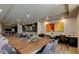 Inviting common area featuring a large table with chairs, lounge seating, and workspace for residents at 2511 W Queen Creek Rd # 179, Chandler, AZ 85248