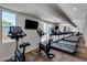 Community gym featuring modern Life Fitness treadmills and cycling machines, ideal for residents' fitness routines at 2511 W Queen Creek Rd # 179, Chandler, AZ 85248