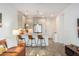 Open kitchen with island seating provides a seamless flow to the living area at 2511 W Queen Creek Rd # 179, Chandler, AZ 85248