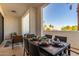 Charming patio with a dining set perfect for enjoying outdoor meals and the beautiful view at 2511 W Queen Creek Rd # 179, Chandler, AZ 85248