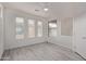 Well-lit bedroom featuring wood-look floors at 14450 N Thompson Peak Pkwy # 216, Scottsdale, AZ 85260