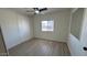 Bedroom with a large closet, window providing natural light and vinyl floors at 8730 E Dolega Ave, Mesa, AZ 85208