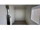 Bedroom walk-in closet with shelving and a hanging rod for storing clothes at 8730 E Dolega Ave, Mesa, AZ 85208