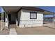 Ramp leading to this adorable home with covered porch and fenced yard at 8730 E Dolega Ave, Mesa, AZ 85208