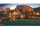 Night view of a stunning property near dramatic rock formations at 1710 E Staghorn Ln, Carefree, AZ 85377