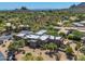 Aerial view of a luxurious home with desert landscape at 1710 E Staghorn Ln, Carefree, AZ 85377