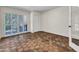 Bright bedroom featuring terracotta tile floors and private patio access at 1710 E Staghorn Ln, Carefree, AZ 85377
