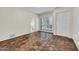 Spacious bedroom with terracotta tile floors, access to bathroom and private patio at 1710 E Staghorn Ln, Carefree, AZ 85377
