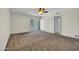 Bright bedroom with carpeted floor and access to patio at 1710 E Staghorn Ln, Carefree, AZ 85377
