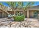 Charming courtyard with flagstone and a mature tree at 1710 E Staghorn Ln, Carefree, AZ 85377