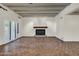 Living room with fireplace and terracotta tile floors at 1710 E Staghorn Ln, Carefree, AZ 85377