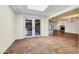 View of living room with terracotta tile flooring and french doors at 1710 E Staghorn Ln, Carefree, AZ 85377