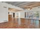 Spacious living room with terracotta tile floors and wood beams at 1710 E Staghorn Ln, Carefree, AZ 85377