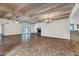 Open living area with high ceilings, tile floors, and fireplace at 1710 E Staghorn Ln, Carefree, AZ 85377