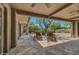 Relaxing stone patio with lounge chairs and mountain views at 1710 E Staghorn Ln, Carefree, AZ 85377