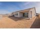 New construction home featuring a large backyard and patio at 17990 W Long Lake Rd, Goodyear, AZ 85338