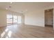 Bright and airy living room with sliding glass doors to patio at 17990 W Long Lake Rd, Goodyear, AZ 85338