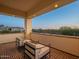 Cozy brick balcony featuring comfortable seating and scenic views of the surrounding landscape at 3955 E Sierra Vista Dr, Paradise Valley, AZ 85253