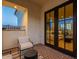 Outdoor balcony with comfortable seating and views of the living room at 3955 E Sierra Vista Dr, Paradise Valley, AZ 85253