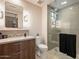 Spa-like bathroom with a glass-enclosed shower, sleek vanity, and modern fixtures at 3955 E Sierra Vista Dr, Paradise Valley, AZ 85253