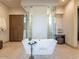 Bright bathroom with a freestanding tub, glass shower, and vanity at 3955 E Sierra Vista Dr, Paradise Valley, AZ 85253