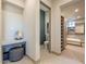 Bathroom vanity area leading to toilet and walk-in closet at 3955 E Sierra Vista Dr, Paradise Valley, AZ 85253