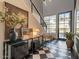 Elegant entryway with decor, black and white tiled floors, and a modern staircase at 3955 E Sierra Vista Dr, Paradise Valley, AZ 85253