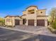 Striking two-story home with a tile roof, desert landscaping, and three-car garage at 3955 E Sierra Vista Dr, Paradise Valley, AZ 85253