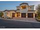 Stunning multi-story home with a three-car garage, well-maintained landscaping, and a beautifully paved driveway at 3955 E Sierra Vista Dr, Paradise Valley, AZ 85253