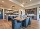 Modern kitchen featuring a large island with seating and stainless steel appliances at 3955 E Sierra Vista Dr, Paradise Valley, AZ 85253