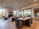 Spacious open-concept living and dining area with hardwood floors and modern decor at 3955 E Sierra Vista Dr, Paradise Valley, AZ 85253