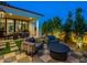 Relaxing outdoor area with comfortable seating, a dining table, and lush greenery for ultimate enjoyment at 3955 E Sierra Vista Dr, Paradise Valley, AZ 85253