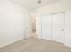 Bright bedroom with double door closet and access to bathroom at 25218 N 160Th Dr, Surprise, AZ 85387