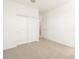 Bright bedroom with carpeted floors and double door closet at 25218 N 160Th Dr, Surprise, AZ 85387