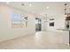 Bright dining area with tile flooring and access to the kitchen at 25218 N 160Th Dr, Surprise, AZ 85387