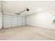 Attached garage with ample space for parking and storage at 25218 N 160Th Dr, Surprise, AZ 85387