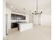 Modern kitchen with dark brown cabinets and granite at 25218 N 160Th Dr, Surprise, AZ 85387