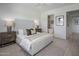 Serene bedroom with a neutral palette, including a glimpse of a luxurious ensuite bathroom at 37200 N Cave Creek Rd # 2110, Scottsdale, AZ 85262